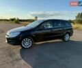 Черный Опель Астра, объемом двигателя 1.6 л и пробегом 175 тыс. км за 6300 $, фото 2 на Automoto.ua