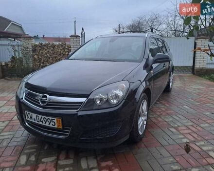 Черный Опель Астра, объемом двигателя 1.6 л и пробегом 209 тыс. км за 5800 $, фото 2 на Automoto.ua