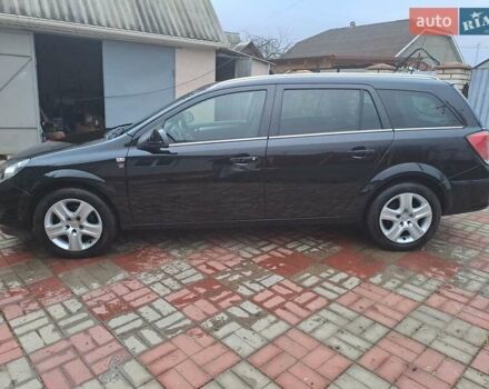 Черный Опель Астра, объемом двигателя 1.6 л и пробегом 209 тыс. км за 5800 $, фото 5 на Automoto.ua