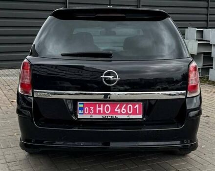 Черный Опель Астра, объемом двигателя 1.6 л и пробегом 152 тыс. км за 7200 $, фото 24 на Automoto.ua
