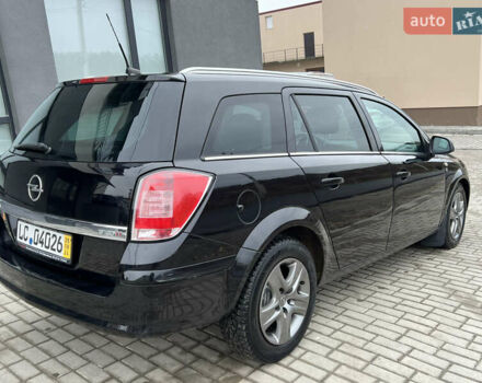 Черный Опель Астра, объемом двигателя 1.7 л и пробегом 264 тыс. км за 5799 $, фото 25 на Automoto.ua