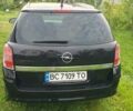 Черный Опель Астра, объемом двигателя 1.4 л и пробегом 150 тыс. км за 6100 $, фото 4 на Automoto.ua