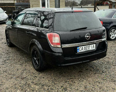 Черный Опель Астра, объемом двигателя 1.69 л и пробегом 242 тыс. км за 6200 $, фото 4 на Automoto.ua