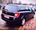 Черный Опель Астра, объемом двигателя 1.6 л и пробегом 212 тыс. км за 5750 $, фото 5 на Automoto.ua