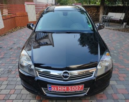 Черный Опель Астра, объемом двигателя 1.4 л и пробегом 215 тыс. км за 5900 $, фото 5 на Automoto.ua