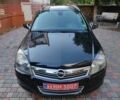 Черный Опель Астра, объемом двигателя 1.4 л и пробегом 215 тыс. км за 5900 $, фото 5 на Automoto.ua
