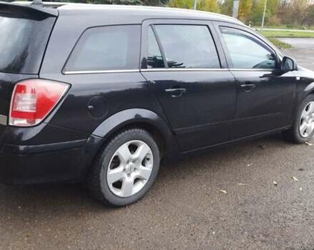 Черный Опель Астра, объемом двигателя 1.69 л и пробегом 252 тыс. км за 5600 $, фото 10 на Automoto.ua