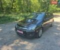 Черный Опель Астра, объемом двигателя 1.7 л и пробегом 250 тыс. км за 6750 $, фото 7 на Automoto.ua