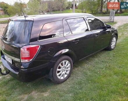 Черный Опель Астра, объемом двигателя 1.7 л и пробегом 280 тыс. км за 5800 $, фото 1 на Automoto.ua