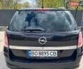 Черный Опель Астра, объемом двигателя 1.91 л и пробегом 335 тыс. км за 5600 $, фото 4 на Automoto.ua