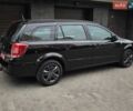 Черный Опель Астра, объемом двигателя 1.6 л и пробегом 178 тыс. км за 5299 $, фото 6 на Automoto.ua