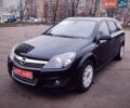 Черный Опель Астра, объемом двигателя 1.6 л и пробегом 172 тыс. км за 5350 $, фото 1 на Automoto.ua