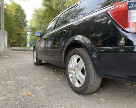 Черный Опель Астра, объемом двигателя 1.6 л и пробегом 200 тыс. км за 6400 $, фото 11 на Automoto.ua