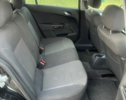 Черный Опель Астра, объемом двигателя 1.6 л и пробегом 319 тыс. км за 5200 $, фото 6 на Automoto.ua