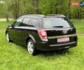 Черный Опель Астра, объемом двигателя 1.6 л и пробегом 208 тыс. км за 5950 $, фото 7 на Automoto.ua