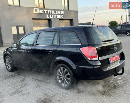 Черный Опель Астра, объемом двигателя 1.6 л и пробегом 219 тыс. км за 5500 $, фото 6 на Automoto.ua