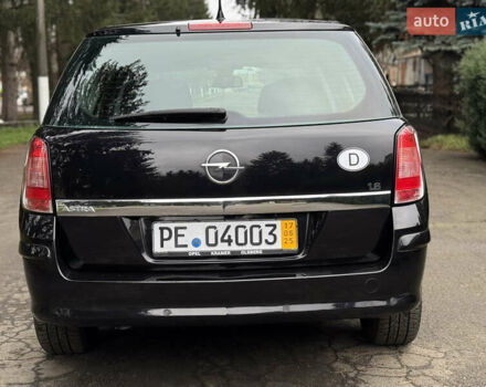 Черный Опель Астра, объемом двигателя 1.6 л и пробегом 228 тыс. км за 5750 $, фото 6 на Automoto.ua