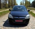 Черный Опель Астра, объемом двигателя 1.6 л и пробегом 230 тыс. км за 6100 $, фото 1 на Automoto.ua