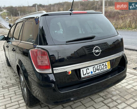 Черный Опель Астра, объемом двигателя 1.7 л и пробегом 264 тыс. км за 5799 $, фото 20 на Automoto.ua