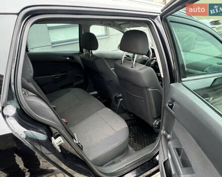 Черный Опель Астра, объемом двигателя 1.7 л и пробегом 264 тыс. км за 5799 $, фото 50 на Automoto.ua