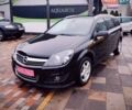 Черный Опель Астра, объемом двигателя 1.6 л и пробегом 212 тыс. км за 5750 $, фото 1 на Automoto.ua