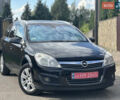 Черный Опель Астра, объемом двигателя 1.6 л и пробегом 195 тыс. км за 5900 $, фото 2 на Automoto.ua