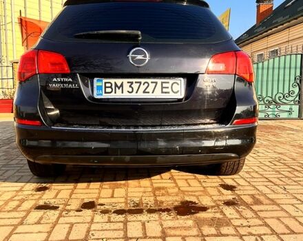 Черный Опель Астра, объемом двигателя 1.7 л и пробегом 252 тыс. км за 7000 $, фото 4 на Automoto.ua