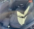 Черный Опель Астра, объемом двигателя 1.25 л и пробегом 243 тыс. км за 7290 $, фото 12 на Automoto.ua