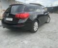 Черный Опель Астра, объемом двигателя 1.4 л и пробегом 300 тыс. км за 4400 $, фото 6 на Automoto.ua
