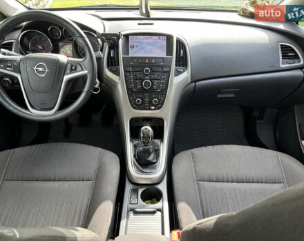 Черный Опель Астра, объемом двигателя 1.25 л и пробегом 243 тыс. км за 8150 $, фото 23 на Automoto.ua