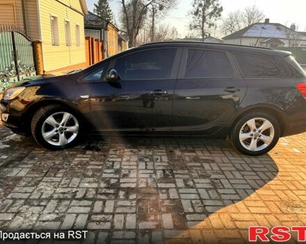 Черный Опель Астра, объемом двигателя 1.7 л и пробегом 252 тыс. км за 7000 $, фото 2 на Automoto.ua