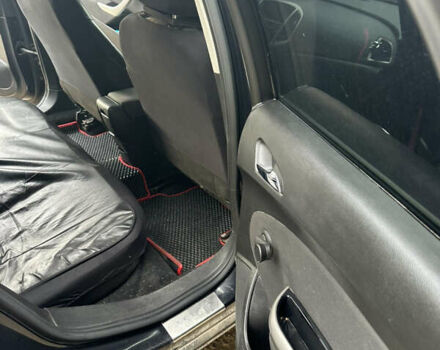 Черный Опель Астра, объемом двигателя 1.3 л и пробегом 264 тыс. км за 6500 $, фото 10 на Automoto.ua