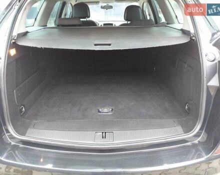 Черный Опель Астра, объемом двигателя 1.25 л и пробегом 1 тыс. км за 6200 $, фото 24 на Automoto.ua