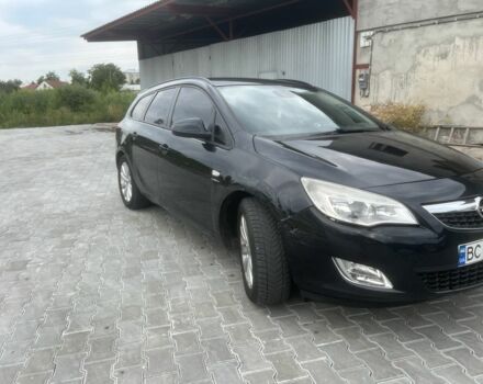 Черный Опель Астра, объемом двигателя 1.4 л и пробегом 300 тыс. км за 4400 $, фото 2 на Automoto.ua