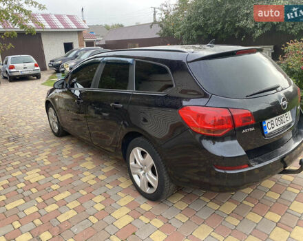 Черный Опель Астра, объемом двигателя 1.69 л и пробегом 280 тыс. км за 6700 $, фото 6 на Automoto.ua