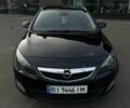 Черный Опель Астра, объемом двигателя 1.2 л и пробегом 230 тыс. км за 5500 $, фото 1 на Automoto.ua