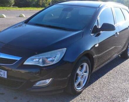 Черный Опель Астра, объемом двигателя 1.25 л и пробегом 300 тыс. км за 6500 $, фото 1 на Automoto.ua