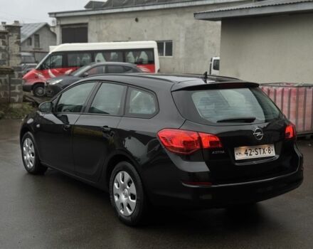 Черный Опель Астра, объемом двигателя 1.4 л и пробегом 225 тыс. км за 6350 $, фото 7 на Automoto.ua