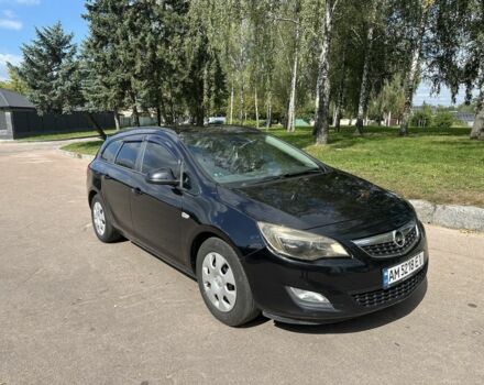 Черный Опель Астра, объемом двигателя 1.2 л и пробегом 345 тыс. км за 5950 $, фото 2 на Automoto.ua