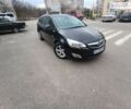 Черный Опель Астра, объемом двигателя 1.4 л и пробегом 225 тыс. км за 7799 $, фото 1 на Automoto.ua