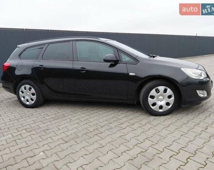 Черный Опель Астра, объемом двигателя 1.25 л и пробегом 1 тыс. км за 6200 $, фото 30 на Automoto.ua