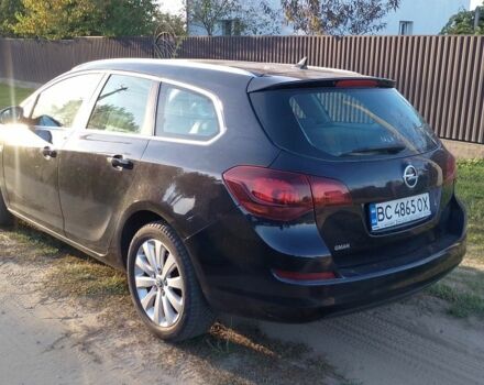 Черный Опель Астра, объемом двигателя 1.7 л и пробегом 217 тыс. км за 7900 $, фото 1 на Automoto.ua