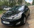 Черный Опель Астра, объемом двигателя 1.4 л и пробегом 230 тыс. км за 5999 $, фото 1 на Automoto.ua