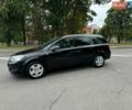 Черный Опель Астра, объемом двигателя 1.6 л и пробегом 170 тыс. км за 6399 $, фото 13 на Automoto.ua