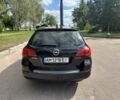 Черный Опель Астра, объемом двигателя 1.2 л и пробегом 345 тыс. км за 5950 $, фото 5 на Automoto.ua