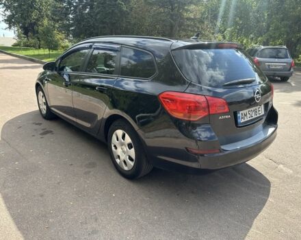 Черный Опель Астра, объемом двигателя 1.2 л и пробегом 345 тыс. км за 5950 $, фото 6 на Automoto.ua