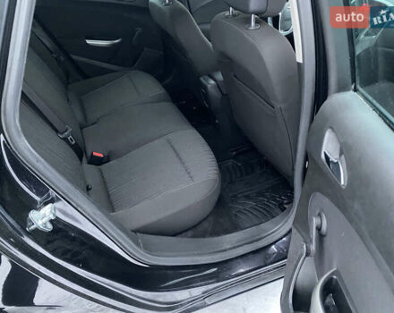 Черный Опель Астра, объемом двигателя 1.6 л и пробегом 230 тыс. км за 7300 $, фото 24 на Automoto.ua