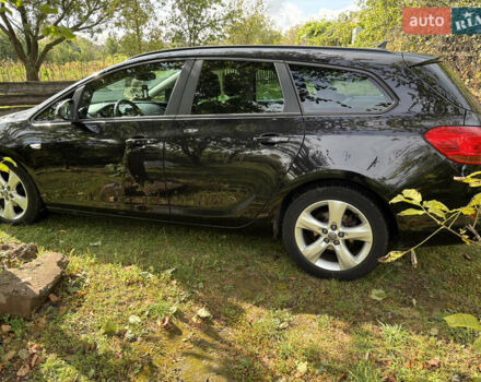 Черный Опель Астра, объемом двигателя 1.25 л и пробегом 243 тыс. км за 8150 $, фото 3 на Automoto.ua