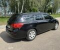 Черный Опель Астра, объемом двигателя 1.2 л и пробегом 345 тыс. км за 5950 $, фото 4 на Automoto.ua