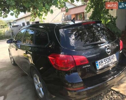 Опель Астра 2011 у Ямпіль на Automoto.ua Чорний Опель Астра, об'ємом двигуна 1.25 л та пробігом 255 тис. км за 5300 $, фото 3 на Automoto.ua